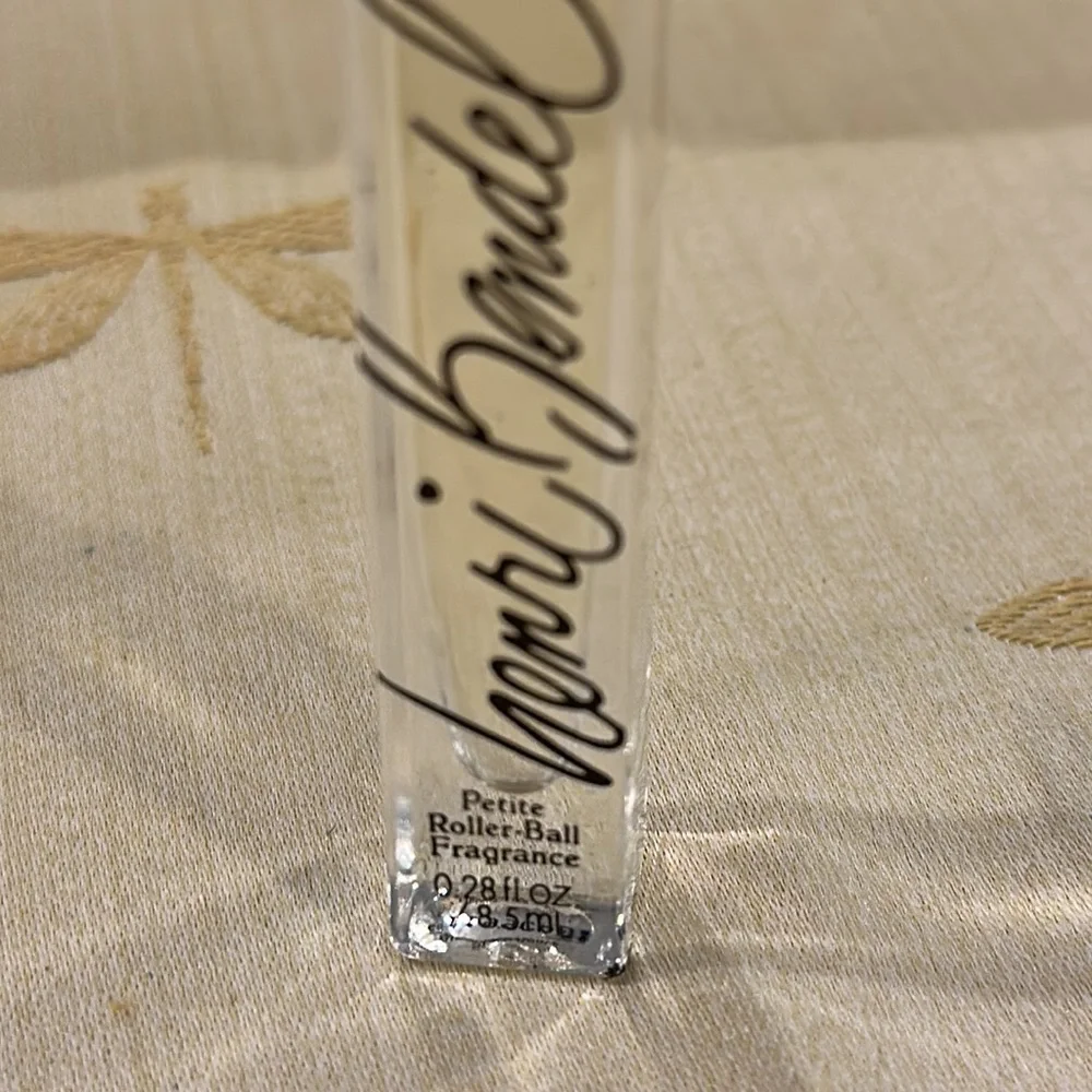 Henri Bendel Spring Blossom & Agave Roller Ball. Needs twice by me. 0.28 fl. oz.